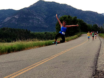 Runner jumping in the air during Star Valley Half Marathon